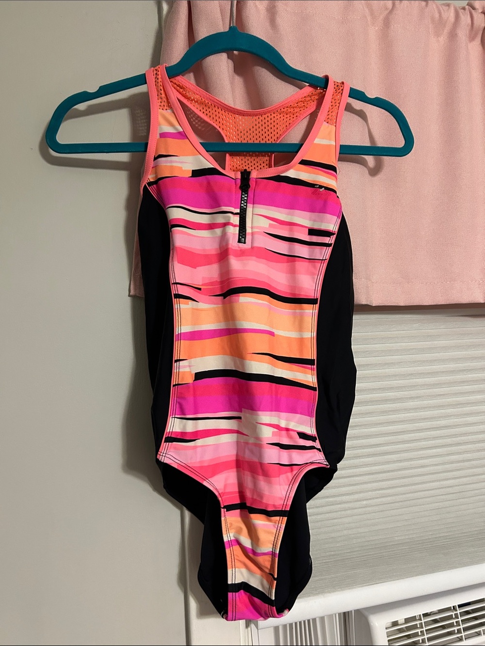 Black One-Piece Swimsuit with Neon Orange Accents